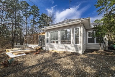 Experience effortless one-level living in this classic brick and on Ponce De Leon Golf Course in Arkansas - for sale on GolfHomes.com, golf home, golf lot