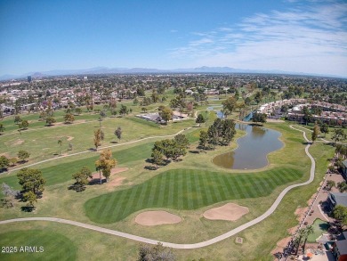 Tucked inside the vibrant, amenity-rich Dobson Ranch community on Dobson Ranch Municipal Golf Course in Arizona - for sale on GolfHomes.com, golf home, golf lot