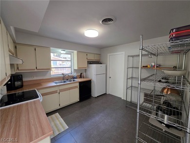 Located in the desirable McGregor Estates corridor of Fort Myers on Fort Myers Country Club in Florida - for sale on GolfHomes.com, golf home, golf lot