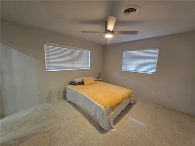 Located in the desirable McGregor Estates corridor of Fort Myers on Fort Myers Country Club in Florida - for sale on GolfHomes.com, golf home, golf lot