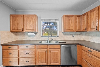 Experience serene, resort-style living in this stunning estate on Babe Zaharias Golf Course in Florida - for sale on GolfHomes.com, golf home, golf lot