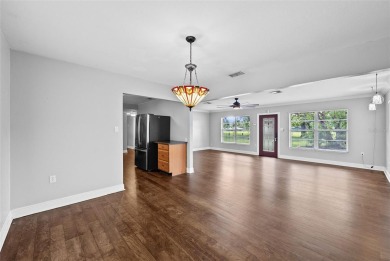 Experience serene, resort-style living in this stunning estate on Babe Zaharias Golf Course in Florida - for sale on GolfHomes.com, golf home, golf lot