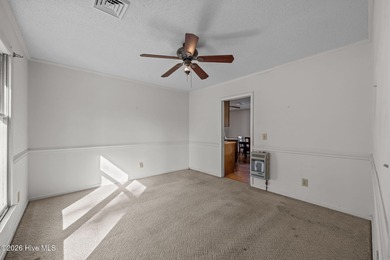 Discover the perfect blend of comfort and utility at 52 on Minnesott Golf and Country Club in North Carolina - for sale on GolfHomes.com, golf home, golf lot