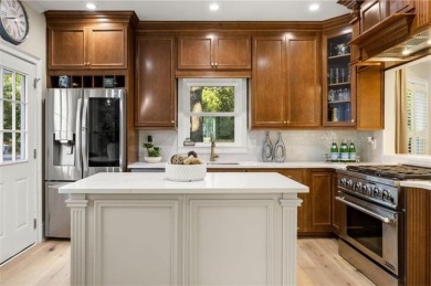 This fully updated charming Charleston-style Collier Hills home on Bobby Jones Golf Club in Georgia - for sale on GolfHomes.com, golf home, golf lot