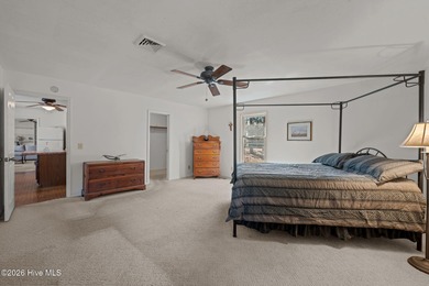 Discover the perfect blend of comfort and utility at 52 on Minnesott Golf and Country Club in North Carolina - for sale on GolfHomes.com, golf home, golf lot