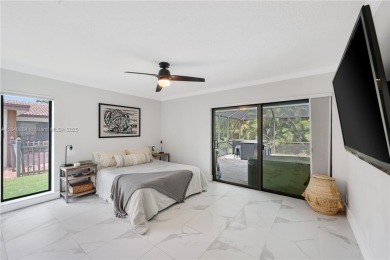 Tucked behind the gates of Boca Greens, this updated 2BD/2BA on Boca Greens Country Club in Florida - for sale on GolfHomes.com, golf home, golf lot