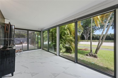 Tucked behind the gates of Boca Greens, this updated 2BD/2BA on Boca Greens Country Club in Florida - for sale on GolfHomes.com, golf home, golf lot