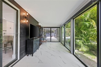 Tucked behind the gates of Boca Greens, this updated 2BD/2BA on Boca Greens Country Club in Florida - for sale on GolfHomes.com, golf home, golf lot