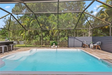 Tucked behind the gates of Boca Greens, this updated 2BD/2BA on Boca Greens Country Club in Florida - for sale on GolfHomes.com, golf home, golf lot