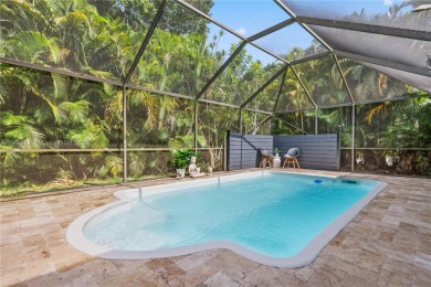 Tucked behind the gates of Boca Greens, this updated 2BD/2BA on Boca Greens Country Club in Florida - for sale on GolfHomes.com, golf home, golf lot