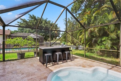 Tucked behind the gates of Boca Greens, this updated 2BD/2BA on Boca Greens Country Club in Florida - for sale on GolfHomes.com, golf home, golf lot