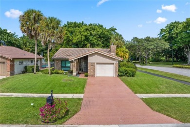 Tucked behind the gates of Boca Greens, this updated 2BD/2BA on Boca Greens Country Club in Florida - for sale on GolfHomes.com, golf home, golf lot