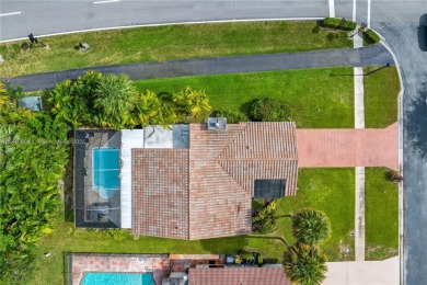 Tucked behind the gates of Boca Greens, this updated 2BD/2BA on Boca Greens Country Club in Florida - for sale on GolfHomes.com, golf home, golf lot
