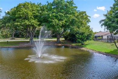 Tucked behind the gates of Boca Greens, this updated 2BD/2BA on Boca Greens Country Club in Florida - for sale on GolfHomes.com, golf home, golf lot