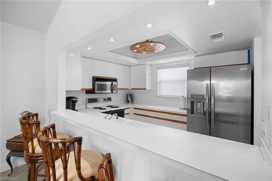 Rarely available and beautifully upgraded, this fully remodeled on Fountain Lakes Community Golf Course in Florida - for sale on GolfHomes.com, golf home, golf lot