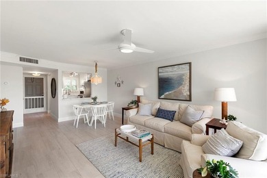 Enjoy breathtaking golf course and lake views from this on Quail Run Golf Club In Naples in Florida - for sale on GolfHomes.com, golf home, golf lot