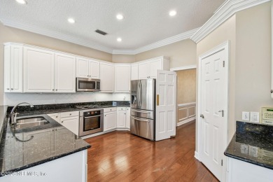 This beautifully maintained home offers breathtaking golf course on Jacksonville Golf and Country Club in Florida - for sale on GolfHomes.com, golf home, golf lot