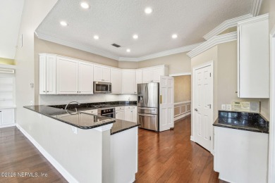 This beautifully maintained home offers breathtaking golf course on Jacksonville Golf and Country Club in Florida - for sale on GolfHomes.com, golf home, golf lot
