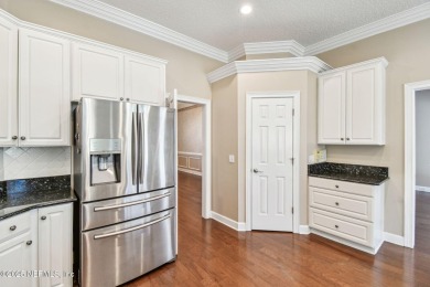 This beautifully maintained home offers breathtaking golf course on Jacksonville Golf and Country Club in Florida - for sale on GolfHomes.com, golf home, golf lot