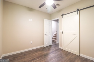 This beautifully remodeled 4 bed, 2 bath home in the Turtle Cove on Turtle Cove Golf Course in Georgia - for sale on GolfHomes.com, golf home, golf lot