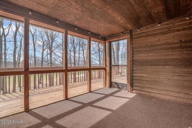 Cedar Chalet on 15th Fairway of Paupack Hills in Tanglwood on Paupack Hills Golf and Country Club in Pennsylvania - for sale on GolfHomes.com, golf home, golf lot