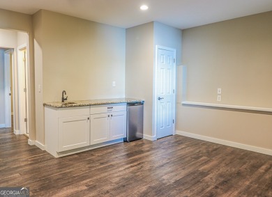 This beautifully remodeled 4 bed, 2 bath home in the Turtle Cove on Turtle Cove Golf Course in Georgia - for sale on GolfHomes.com, golf home, golf lot