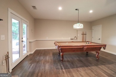 This beautifully remodeled 4 bed, 2 bath home in the Turtle Cove on Turtle Cove Golf Course in Georgia - for sale on GolfHomes.com, golf home, golf lot
