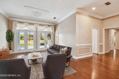 This beautifully maintained home offers breathtaking golf course on Jacksonville Golf and Country Club in Florida - for sale on GolfHomes.com, golf home, golf lot