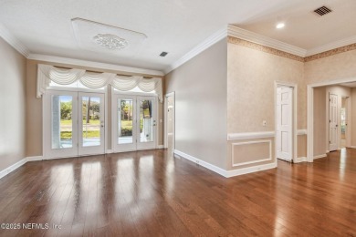 This beautifully maintained home offers breathtaking golf course on Jacksonville Golf and Country Club in Florida - for sale on GolfHomes.com, golf home, golf lot