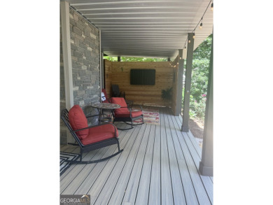 This beautifully remodeled 4 bed, 2 bath home in the Turtle Cove on Turtle Cove Golf Course in Georgia - for sale on GolfHomes.com, golf home, golf lot