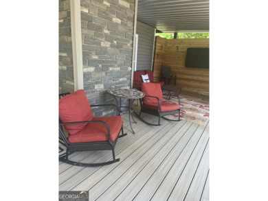 This beautifully remodeled 4 bed, 2 bath home in the Turtle Cove on Turtle Cove Golf Course in Georgia - for sale on GolfHomes.com, golf home, golf lot