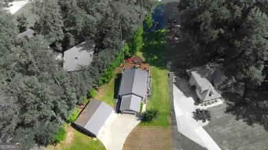 This beautifully remodeled 4 bed, 2 bath home in the Turtle Cove on Turtle Cove Golf Course in Georgia - for sale on GolfHomes.com, golf home, golf lot