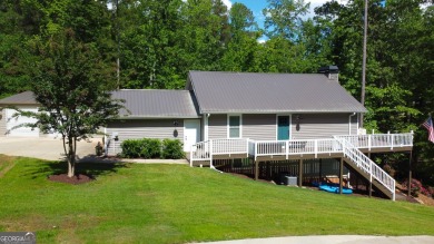 This beautifully remodeled 4 bed, 2 bath home in the Turtle Cove on Turtle Cove Golf Course in Georgia - for sale on GolfHomes.com, golf home, golf lot