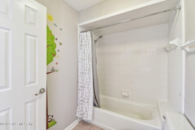 This beautifully maintained home offers breathtaking golf course on Jacksonville Golf and Country Club in Florida - for sale on GolfHomes.com, golf home, golf lot