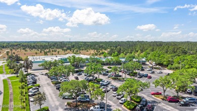 BRAND NEW ROOF - JUST INSTALLED THIS YEAR! The living is ''oh so on Halifax Plantation Golf Club in Florida - for sale on GolfHomes.com, golf home, golf lot
