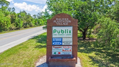 BRAND NEW ROOF - JUST INSTALLED THIS YEAR! The living is ''oh so on Halifax Plantation Golf Club in Florida - for sale on GolfHomes.com, golf home, golf lot