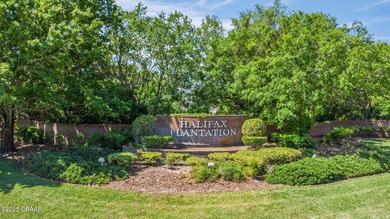 BRAND NEW ROOF - JUST INSTALLED THIS YEAR! The living is ''oh so on Halifax Plantation Golf Club in Florida - for sale on GolfHomes.com, golf home, golf lot