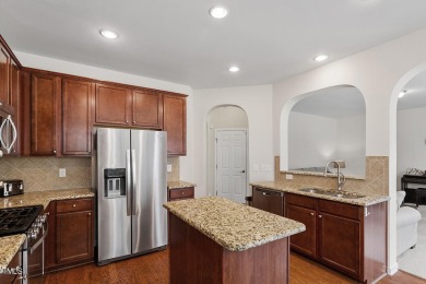 Sweeping hardwood floors welcome you into this Heritage Wake on Heritage Golf Club in North Carolina - for sale on GolfHomes.com, golf home, golf lot