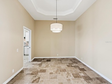 Enjoy tranquil lake views from this beautifully updated on Pelican Pointe Golf and Country Club in Florida - for sale on GolfHomes.com, golf home, golf lot
