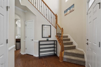 Sweeping hardwood floors welcome you into this Heritage Wake on Heritage Golf Club in North Carolina - for sale on GolfHomes.com, golf home, golf lot