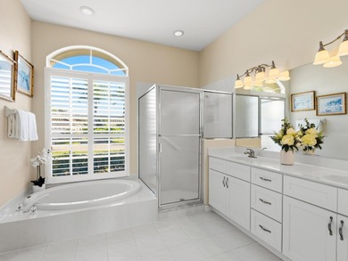 Enjoy tranquil lake views from this beautifully updated on Pelican Pointe Golf and Country Club in Florida - for sale on GolfHomes.com, golf home, golf lot