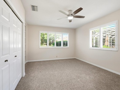 Enjoy tranquil lake views from this beautifully updated on Pelican Pointe Golf and Country Club in Florida - for sale on GolfHomes.com, golf home, golf lot
