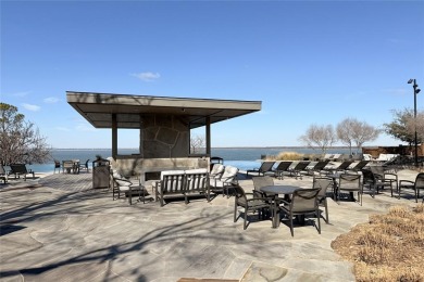 A beautifully designed 3-bedroom, 2-bathroom home by Meritage on The Tribute At the Colony in Texas - for sale on GolfHomes.com, golf home, golf lot