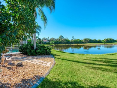 Enjoy tranquil lake views from this beautifully updated on Pelican Pointe Golf and Country Club in Florida - for sale on GolfHomes.com, golf home, golf lot