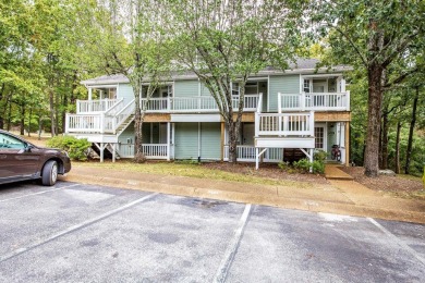 This stunning, updated studio is tucked away among the trees on on Mountain Ranch Golf Club in Arkansas - for sale on GolfHomes.com, golf home, golf lot