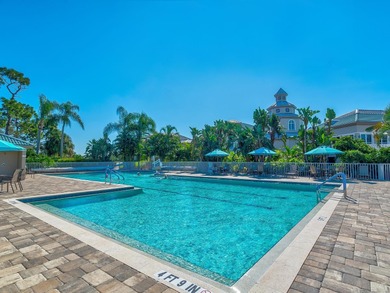 Enjoy tranquil lake views from this beautifully updated on Pelican Pointe Golf and Country Club in Florida - for sale on GolfHomes.com, golf home, golf lot