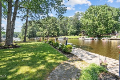 The Ultimate Summer Getaway awaits you at Lake Royale, a Lake on River Golf and County Club at Lake Royale in North Carolina - for sale on GolfHomes.com, golf home, golf lot