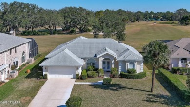 A meticulous 3 bedroom, 2 bath with an attached 2 car garage on Spruce Creek Golf Club in Florida - for sale on GolfHomes.com, golf home, golf lot