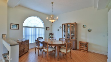 A meticulous 3 bedroom, 2 bath with an attached 2 car garage on Spruce Creek Golf Club in Florida - for sale on GolfHomes.com, golf home, golf lot