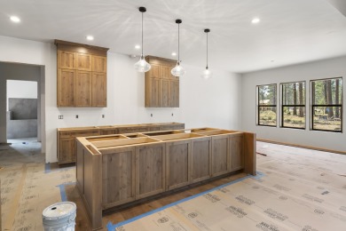 Overlooking the tranquil setting of Preservation Park, this on Sunriver Caldera Springs Golf Course in Oregon - for sale on GolfHomes.com, golf home, golf lot